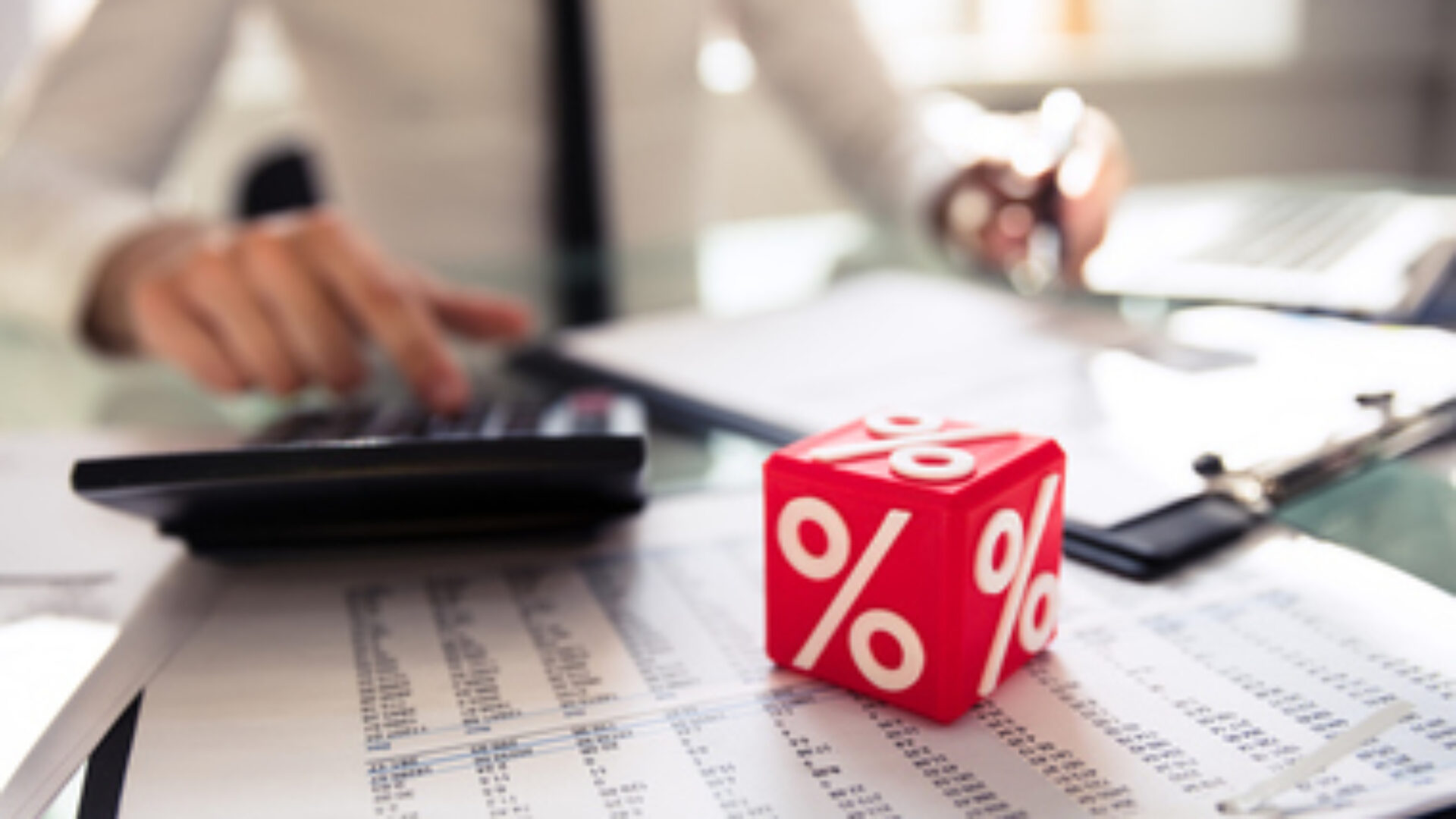 Close-up Of Red Cubic Block With Percentage Symbol