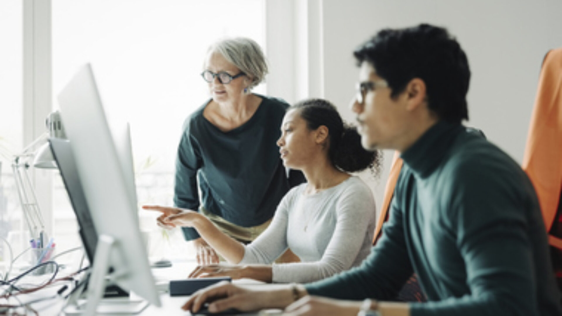 Business people working together in an engineering office