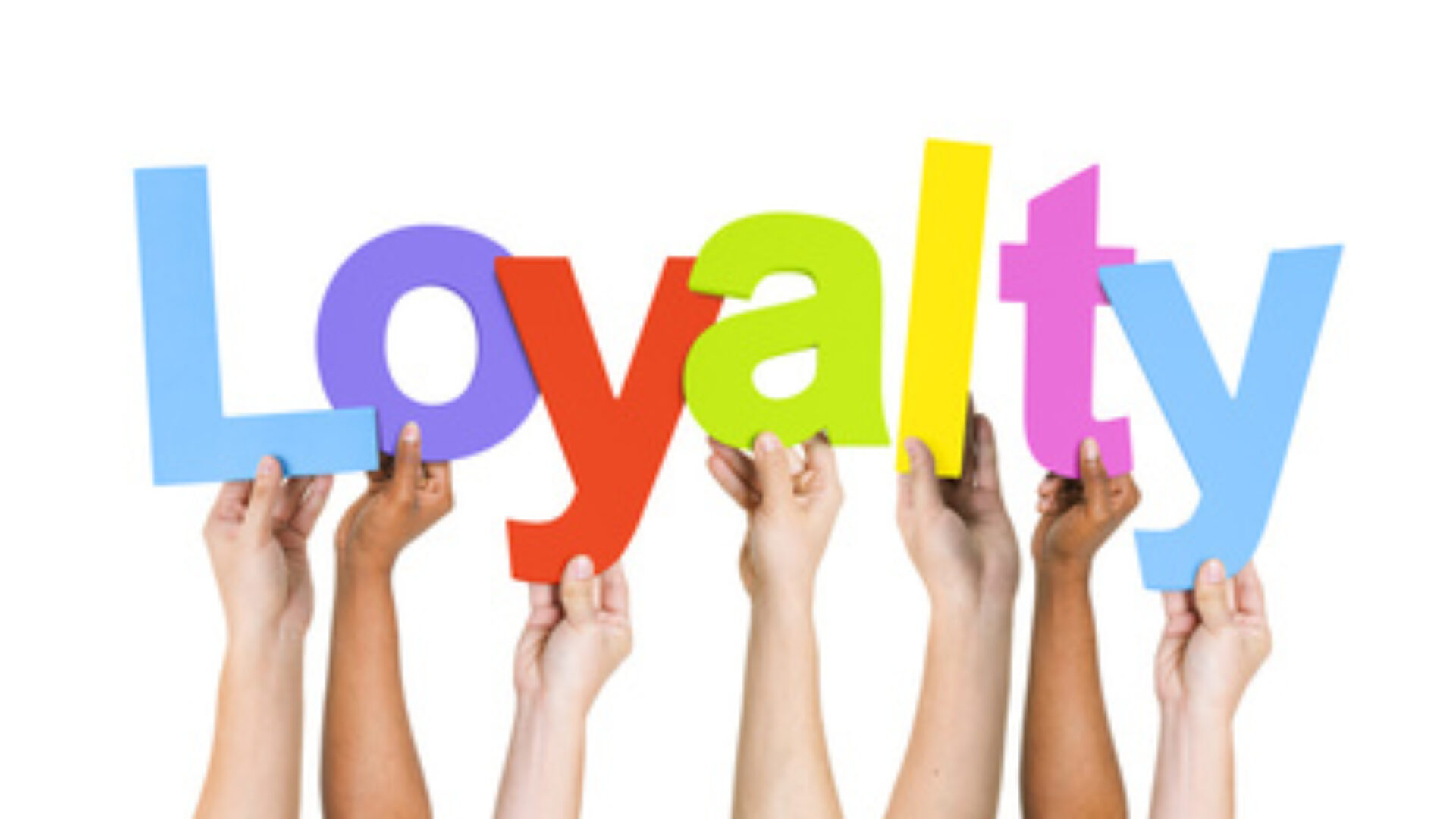 Multi Ethnic People Holding The Word Loyalty