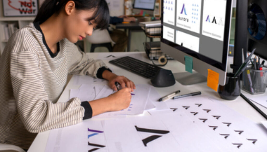 Asian Graphic designer working in office. Designing logo Artist Creative Designer Illustrator Graphic Skill Concept.