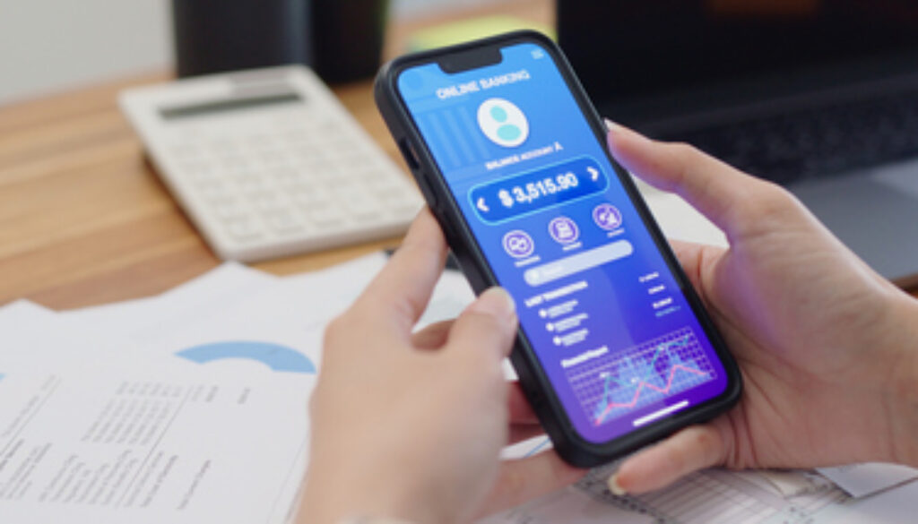 Close up Asian woman holding smartphone use credit card checking for make online utility bill payment,contactless Internet banking technology and money transfer