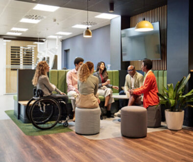 Business team meeting in modern office sitting area