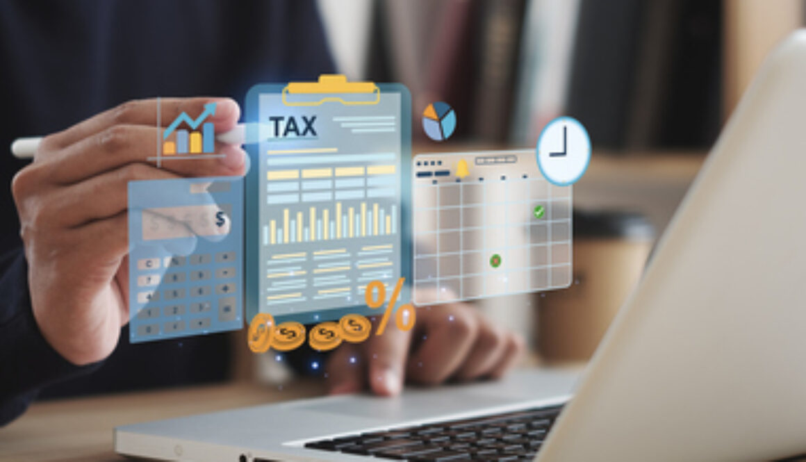 Tax concept. Person using computer to fill out personal income tax return to pay taxes online. State tax. Financial research. data analysis, documents, reports, tax returns, calculations.