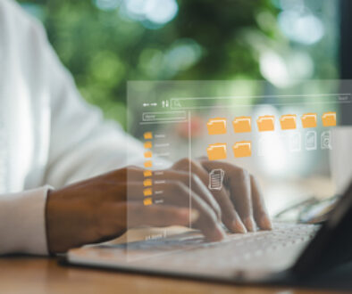 Businesswoman using a computer to document management, Document Management System (DMS) being setup by IT consultant working on laptop computer in office, Efficiently manage and information files.