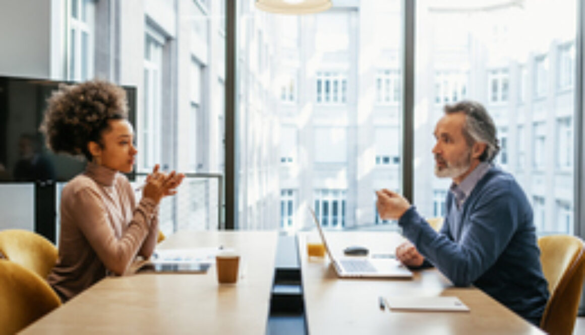 Diverse business people in office on business meeting. Job candidate at interview with senior manager