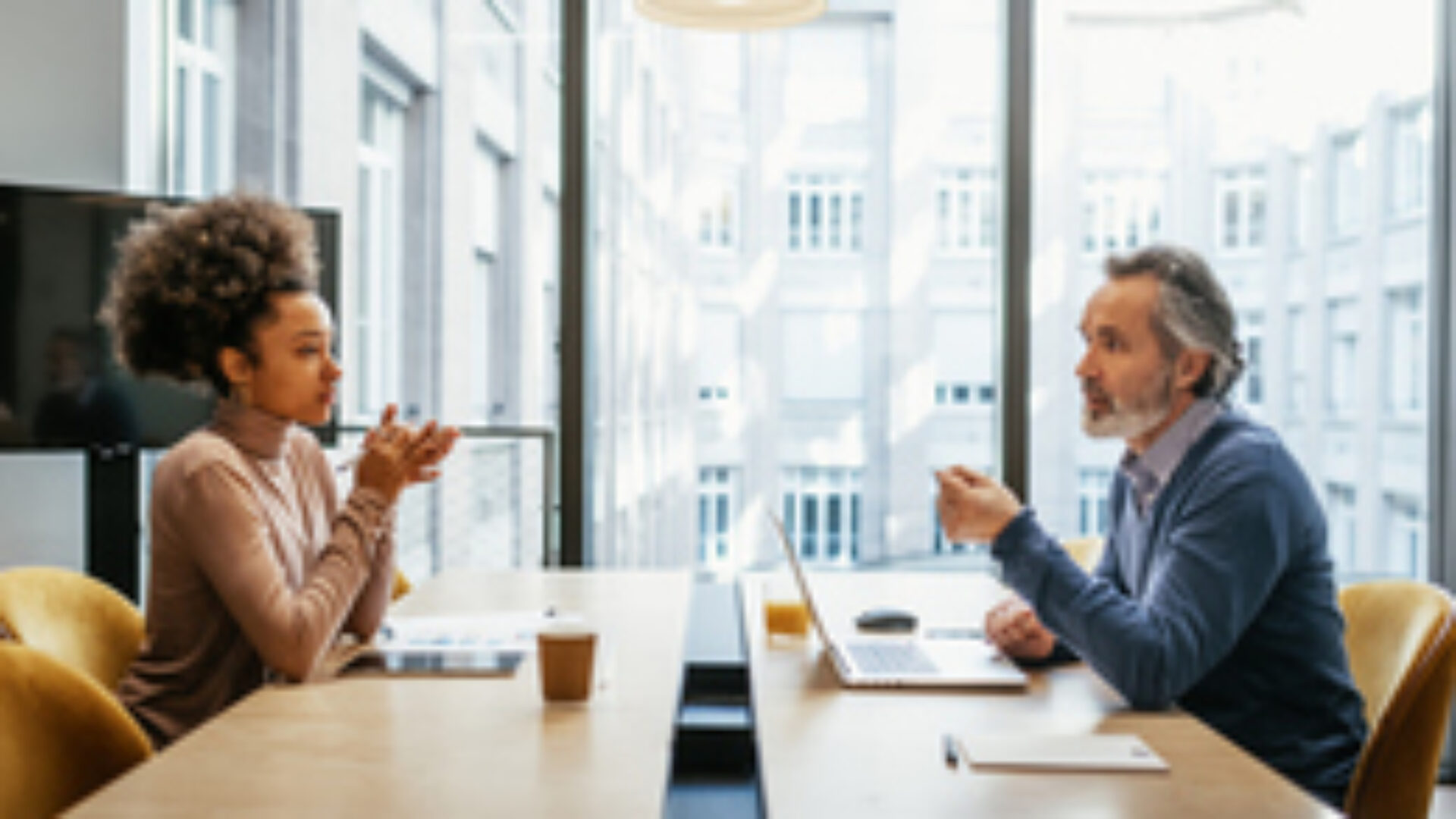 Diverse business people in office on business meeting. Job candidate at interview with senior manager