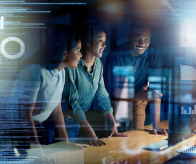 Overlay, futuristic and programmer team coding a future app, website or web on the internet online at night in an office. Overtime, teamwork and group of people or colleagues planning for innovation