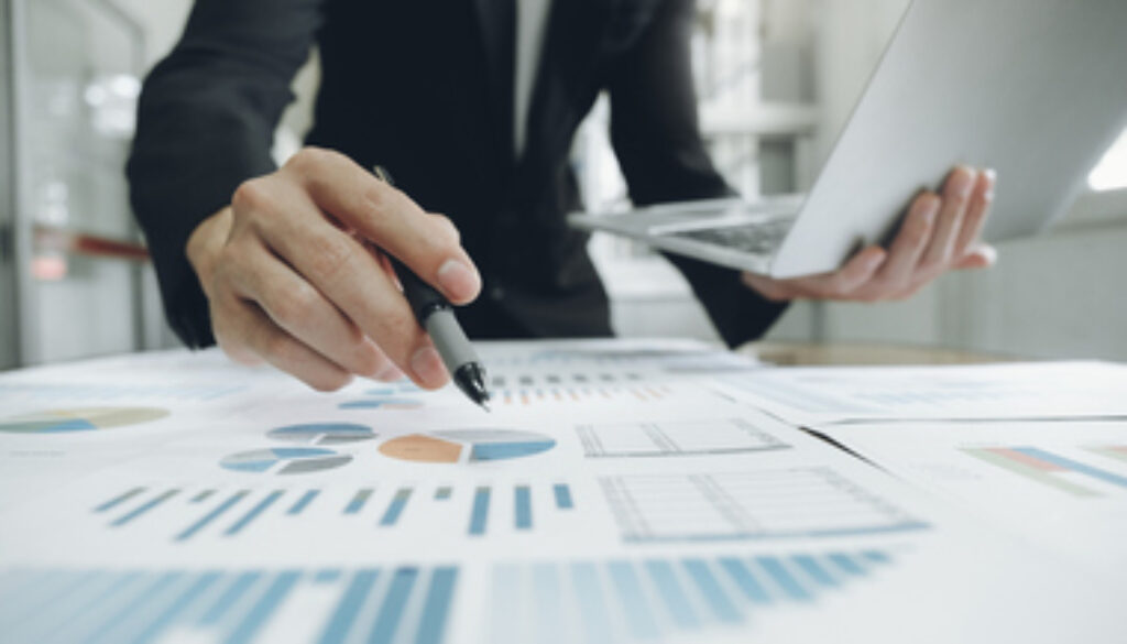 Businessman analyse investment marketing data.