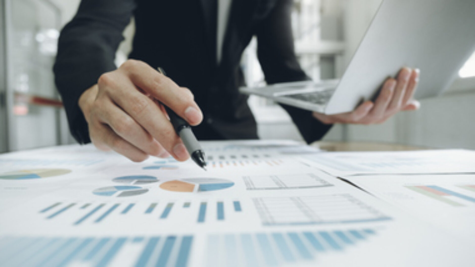 Businessman analyse investment marketing data.