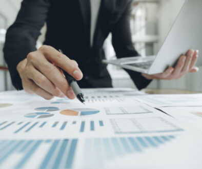 Businessman analyse investment marketing data.