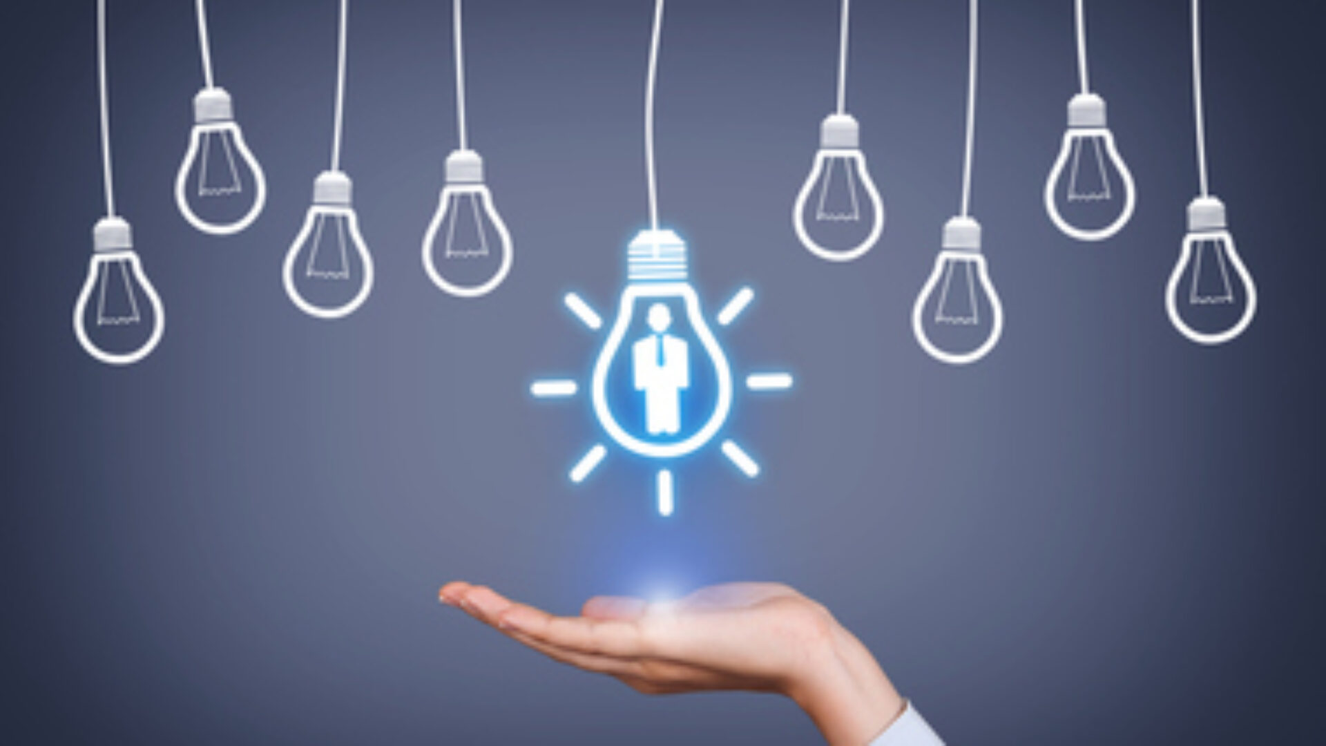 New Human Resource Idea Light Bulb on Human Hand